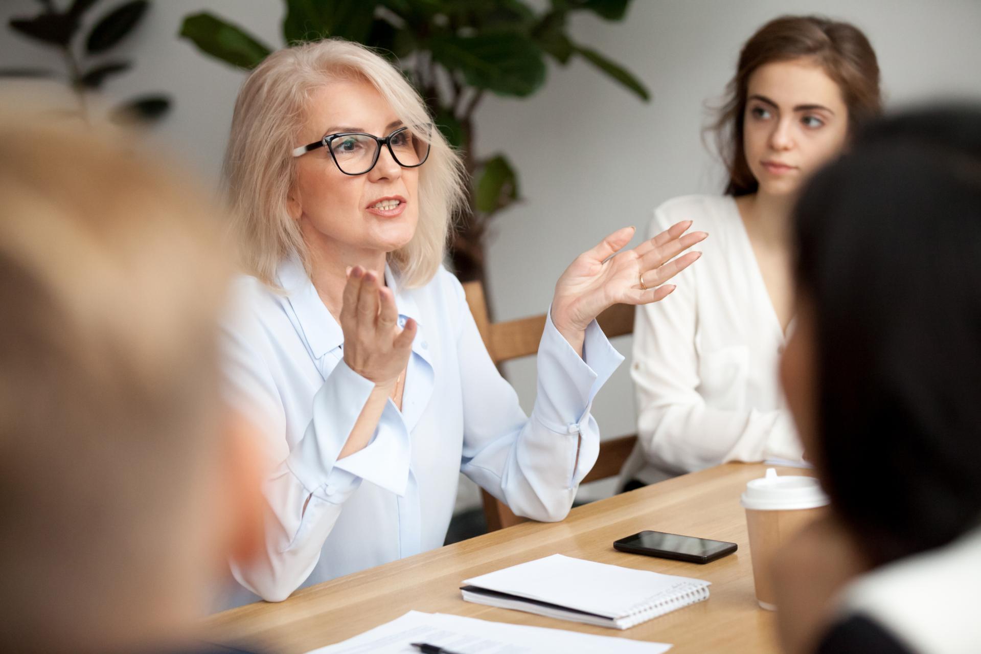 Lady talking in a business meeting