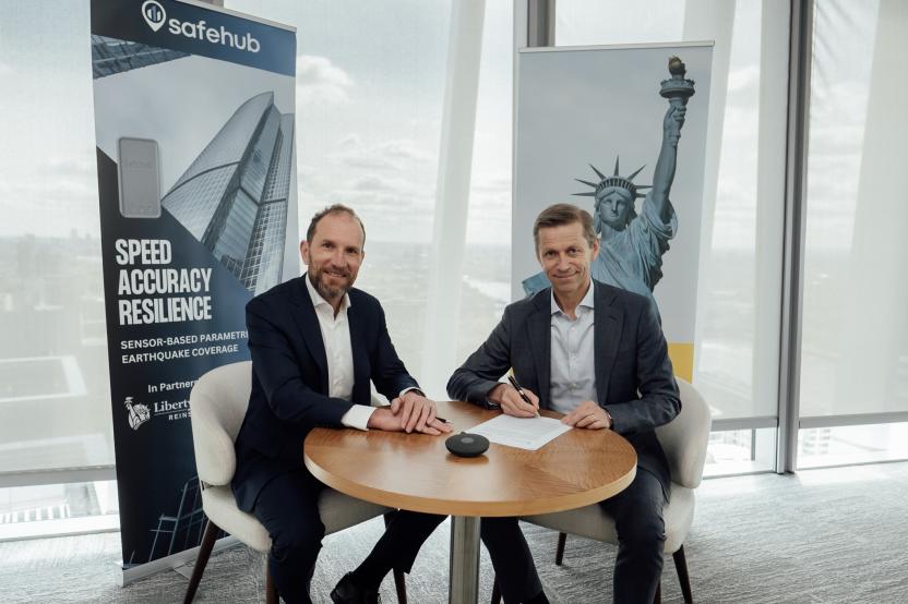 Dieter Winkel and Andy Thompson signing Safehub contract